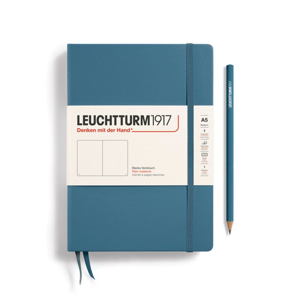 A stone blue colored hardcover notebook.